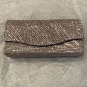 NWT Rose Gold clutch